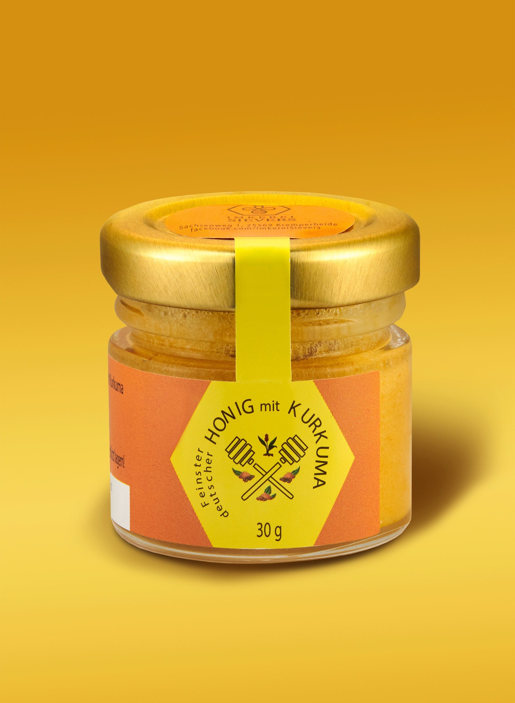 Kurkuma Honig von ekovita in einem Glasbehälter, Premium Naturprodukt mit goldener Farbe.