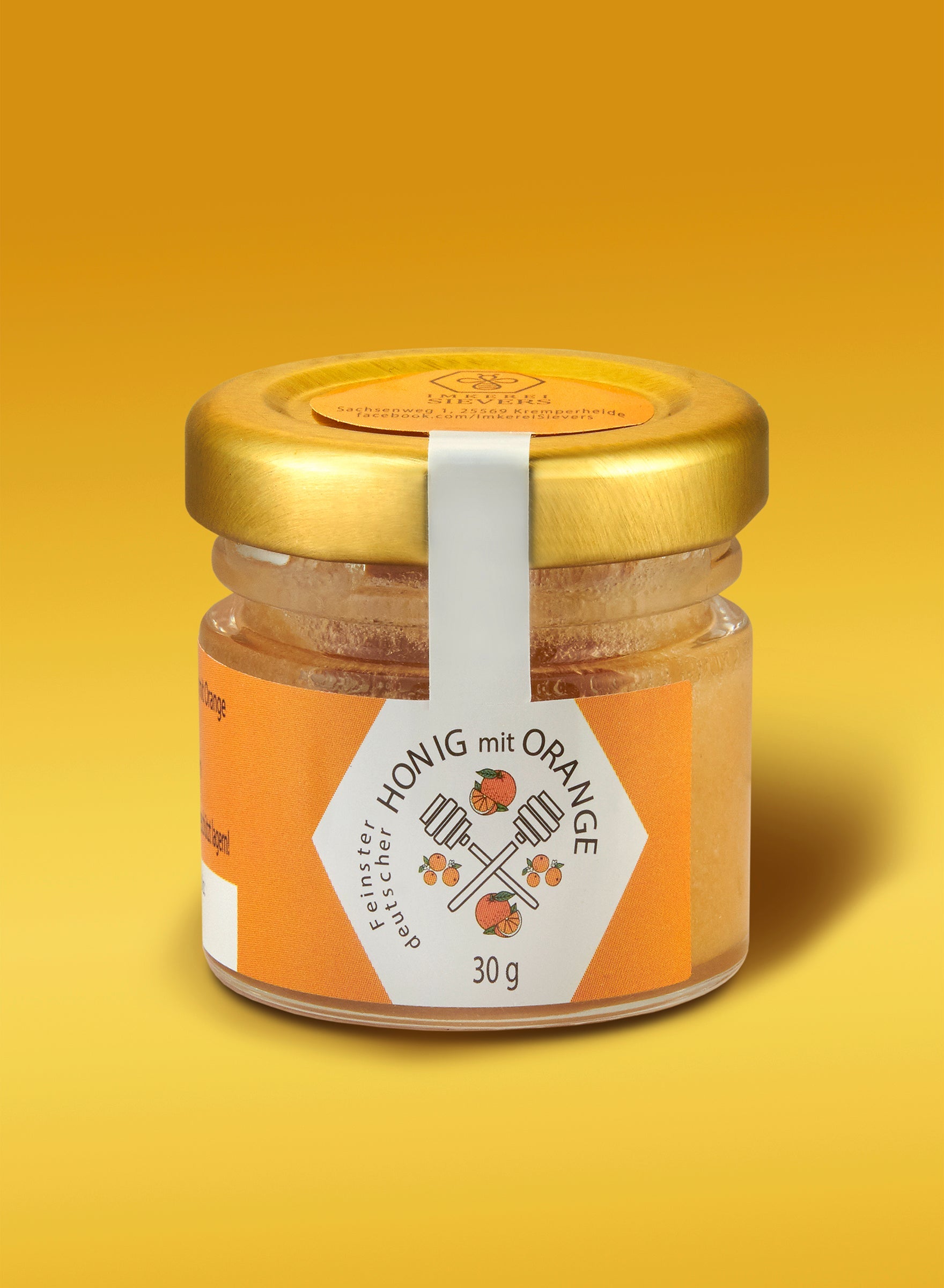 Premium Honig mit Orange von ekovita in einer eleganten Glasverpackung, ideal für ein gesundes Frühstück.