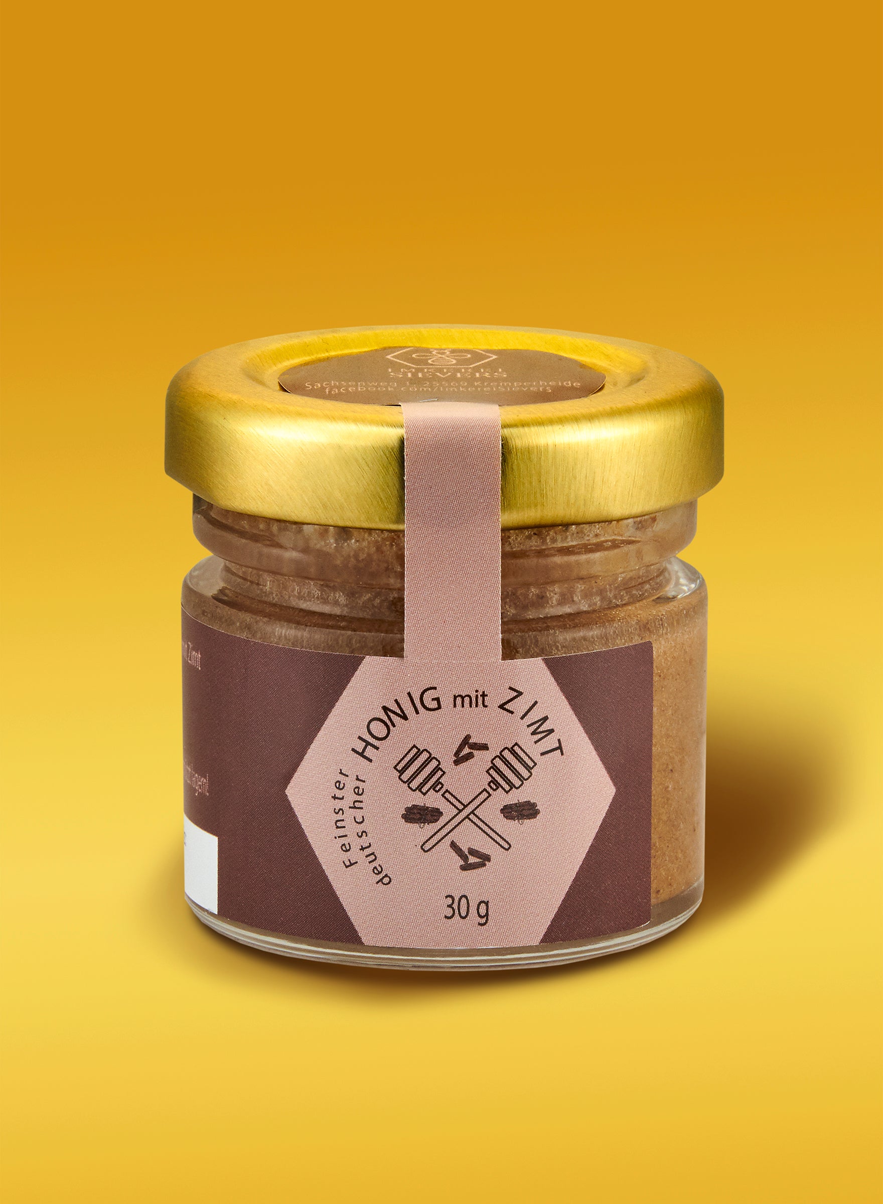 Premium Honig mit Ceylon-Zimt in eleganter Glaspfanne von Nordbienchen, ideal für natürlichen Genuss.