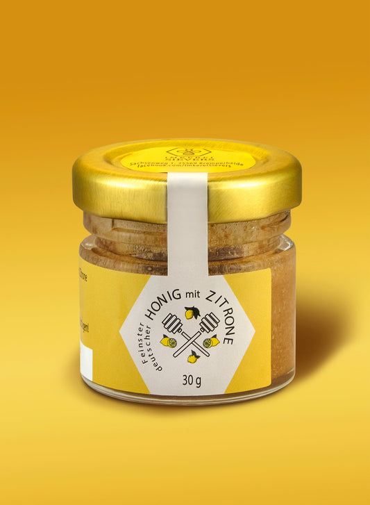 Premium Honig mit Zitrone von ekovita in einer eleganten Glasverpackung, 100% Natur, ideal für die Gesundheit.