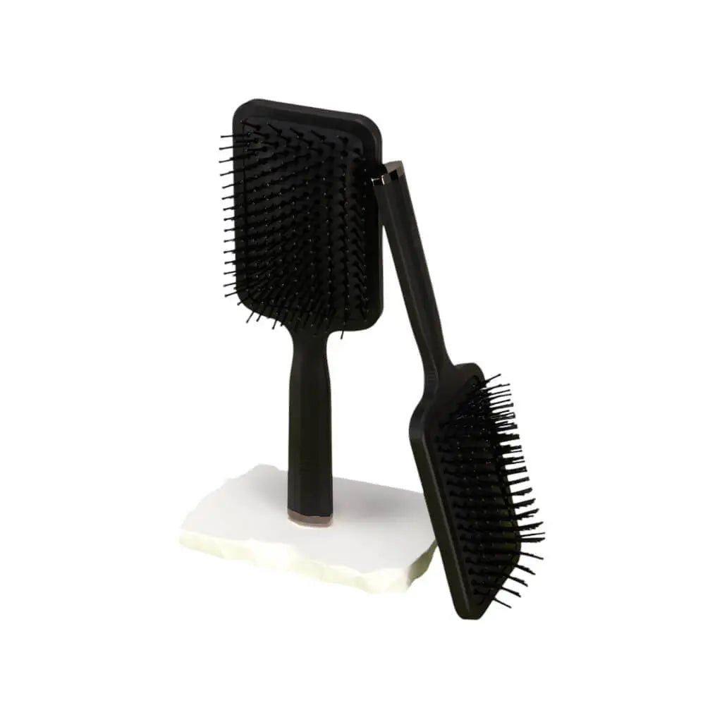 Premium Haarpflege Bürste in der Originalverpackung, perfekt für Pflege und Styling.