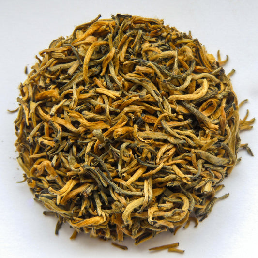 Tippy Golden Yunnan Schwarztee in einer eleganten Verpackung, ideal zum Genießen und Kaufen.