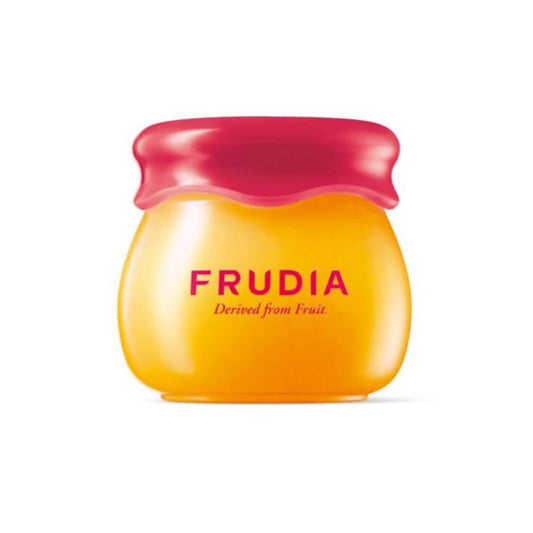 FRUDIA Pomegranate Honey Lip Balm in einer klaren Dose, ideal für intensive Lippenpflege.