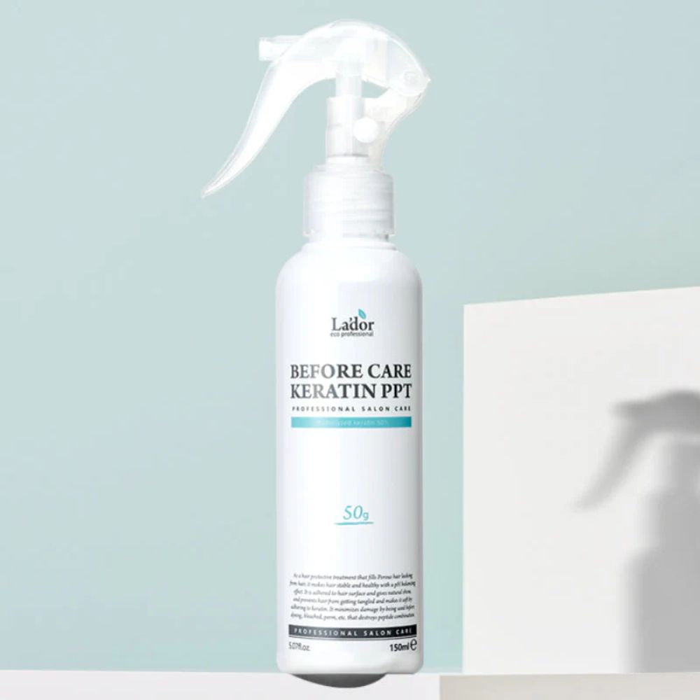 Detailansicht der LADOR Haarpflegeflasche mit Hitzeschutz Eigenschaften, ideal für geschädigtes Haar in der koreanischen Kosmetik.