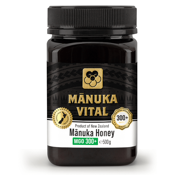 Premium Manuka Honig MGO 300+ von ekovita in einem eleganten Glasbehälter mit goldener Etikettierung.