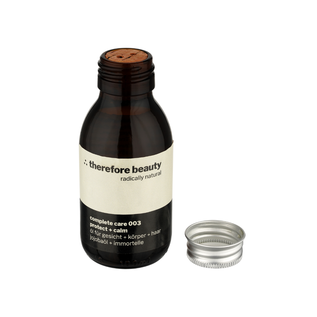 Inhaltsstoffe des Complete Care 003 Pflegeöls, betont die veganen und natürlichen Eigenschaften.